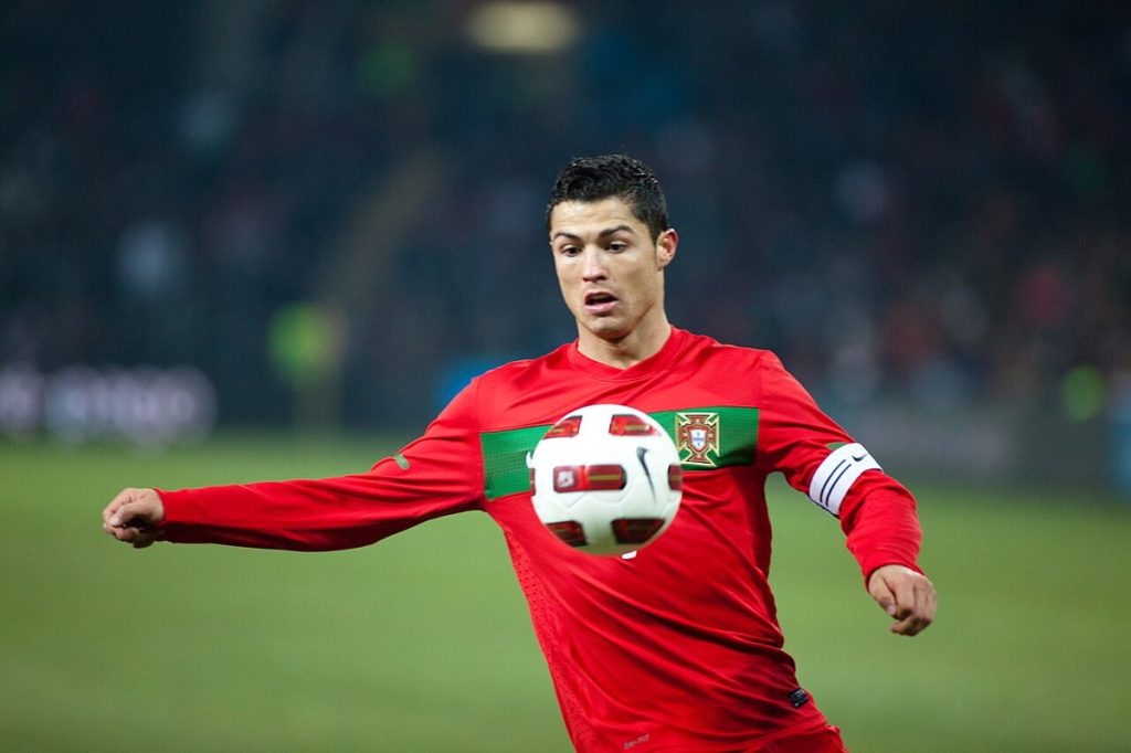 Ronaldo’s Walkout Brings a 30-Day Portugal Ban A footballer in a Portugal national team shirt